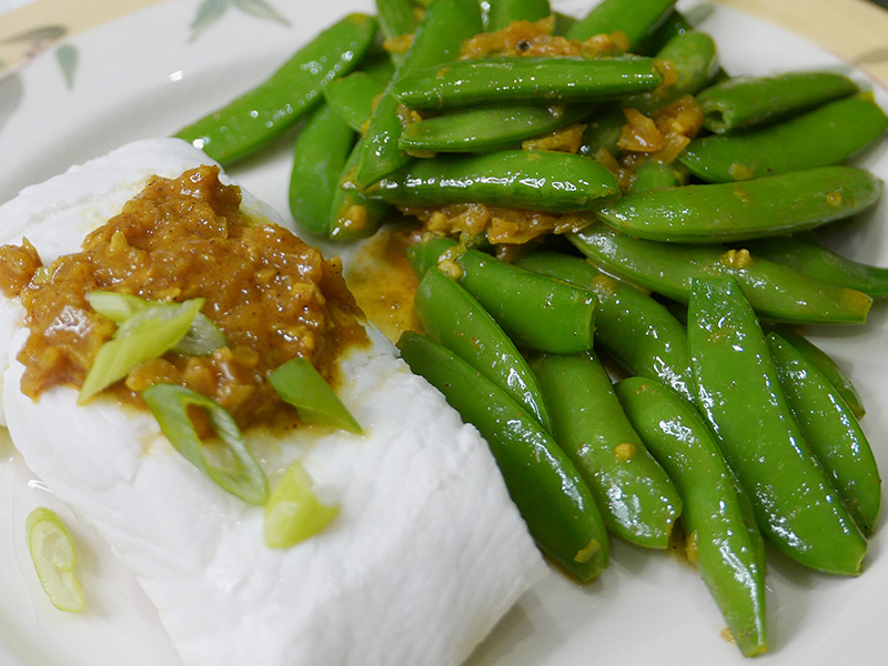 Halibut with Curry Butter and Snap Peas